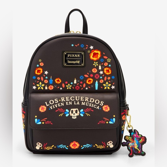 Loungefly Handbags - NWT Loungefly Disney Pixar Coco floral embroidered backpack